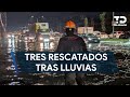 Rescatan a 3 personas de autos varados por las fuertes lluvias en Guadalupe