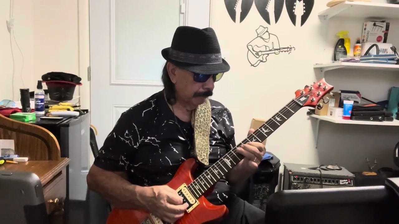 Mike Torres playing guitar