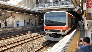 武蔵野線209系　回送列車として大宮駅を発車するシーン