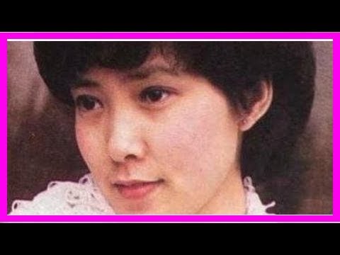 58歲的沈丹萍端莊優雅，一家人幸福快樂，外孫可愛調皮