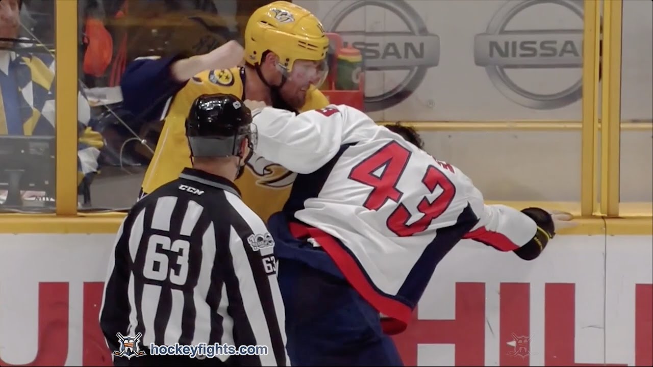 Nate Thompson drops the gloves against Tom Wilson for his first ...