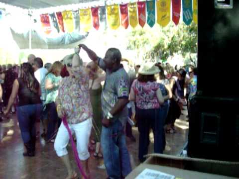 www.horacetrahan.com Sebastopol Zydeco Festival in California Sep. 11, 2010 ;Dancers dancing to Horace Trahan playing with Andre Thierry and his Zydeco Band