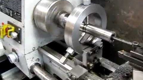 Large home made fixed steady being used to center bore on a Chinese lathe