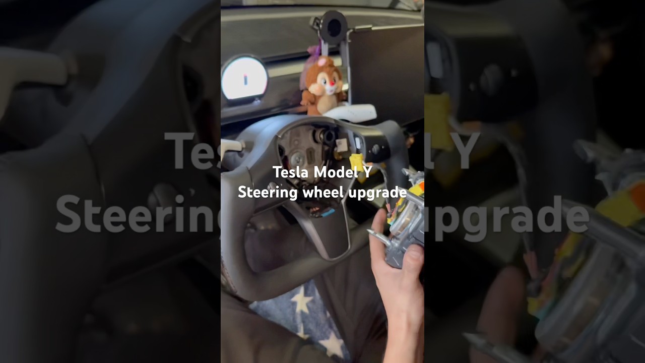 Tesla model Y steering wheel upgrade. AT230 Garage