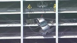 Car dangles from Santa Monica parking garage