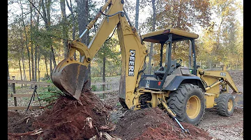 Jak velký je bagr John Deere 310?