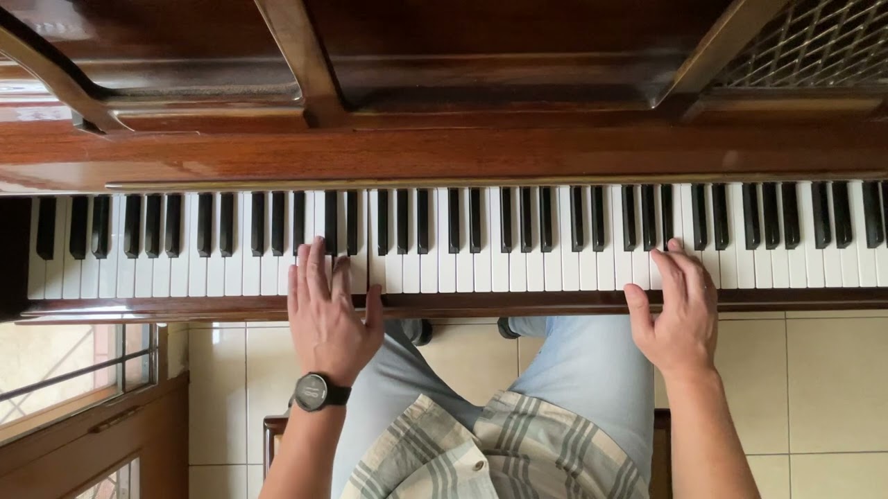 Somewhere My Love on piano. 