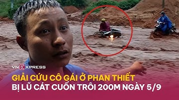 Khoảnh khắc giải cứu cô gái bị lũ cát cuốn trôi 200m ở Phan Thiết | VnExpress