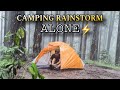 Solo camping in rainstorm  heavy rain  flood thunder  forced to seek shelter