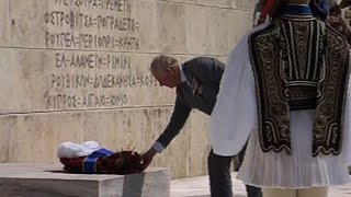 Prince Charles and Camilla lay wreath at unknown soldier's grave