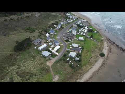 The rivermouth and reef from the air on a clean swell., Ākitio surf spot, Wellington / Wairarapa, New Zealand.
