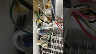 Fixing a refrigerator by replacing a defrost thermostat and condenser fan motor. #Handsomeorhandy ￼