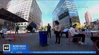 People interact with Cornell University's robotic trash cans screenshot 4