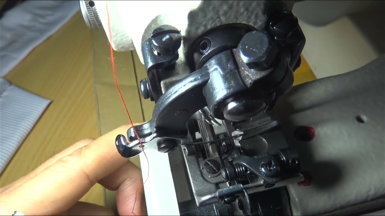 AT07  Blind stitch needle plate height adjust