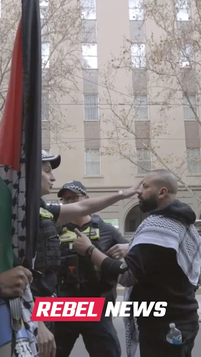 Victoria Police move on Palestinian agitators trying to disrupt an ANTI-TERROR rally in Melbourne