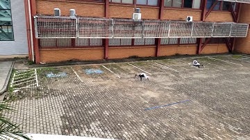 Outdoor trajectory tracking and load transportation using a quadrotor formation and adaptive SMC