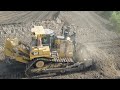 Reclamation Of Mining Area -  Komatsu &amp; Caterpillar Bulldozers In Action - Aerial View