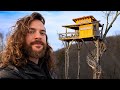 Winter camping in cozy treehouse