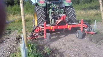 Inter-row machine in action in a brand new vineyard in France #tractors #farming #grapes #wine