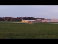 Landing the J-3 Cub with floats on the grass back at the airport