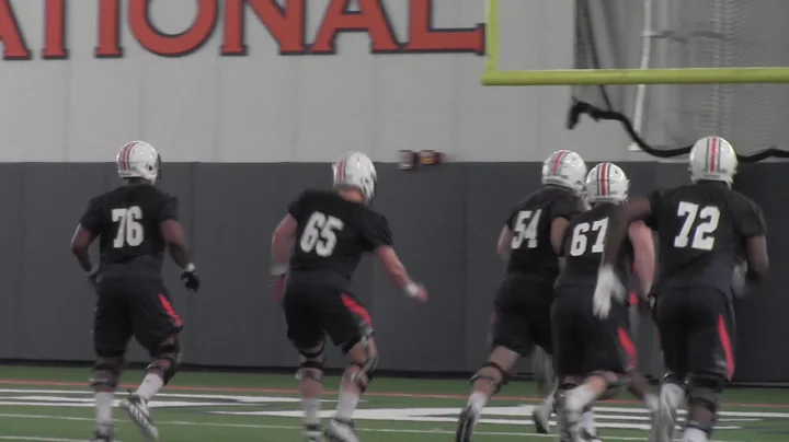 Auburn's offense runs no-huddle drills