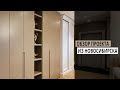 Красивая и удобная мебель в комнате-студии: прихожая и гостиная. Шкаф в современном стиле. Дизайн.