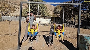 "Traveling to the city to buy play equipment and building a play device to make the children happy"