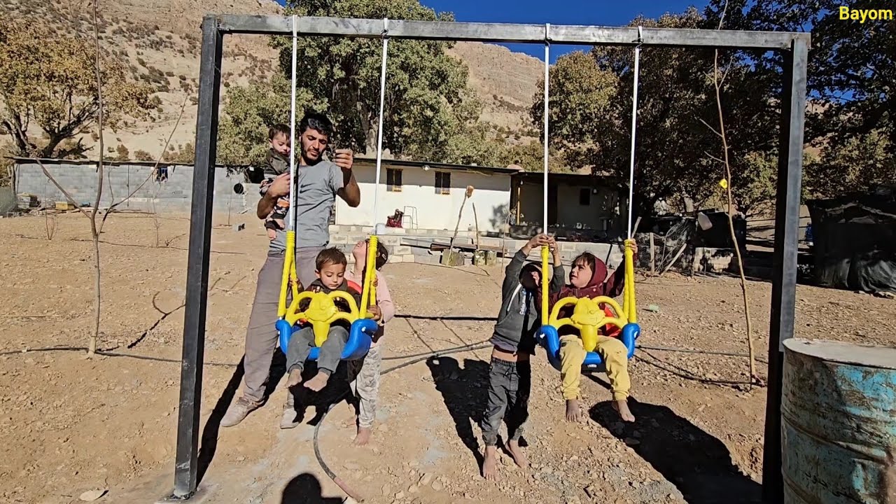 "Traveling to the city to buy play equipment and building a play device to make the children happy"