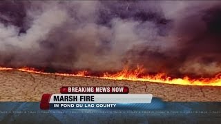Crews battle several area fires, including large marsh fire