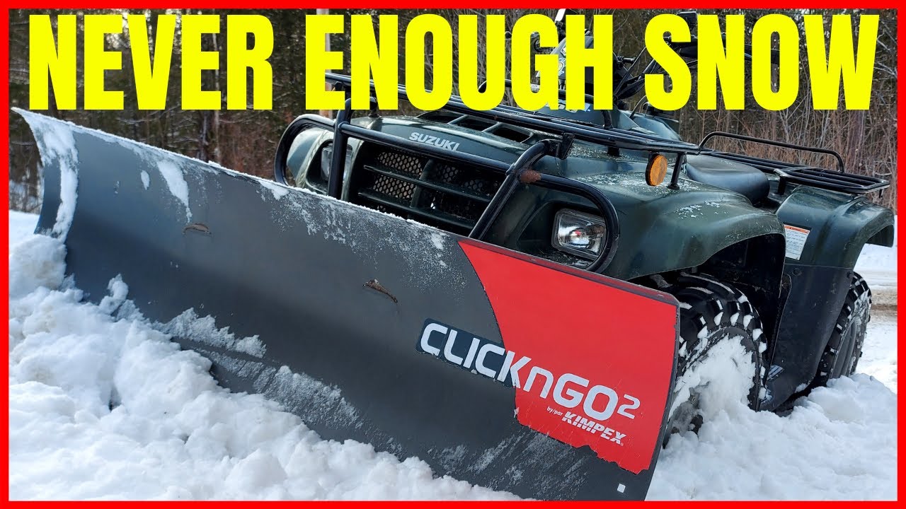 Plowing Snow with a Four Wheeler Suzuki Eiger ATV Gets The Job Done