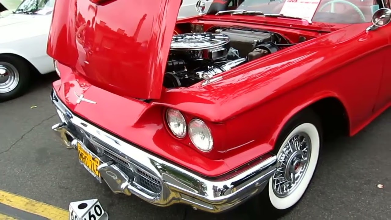 Awesome red 1960 Thunderbird with Fender skirts