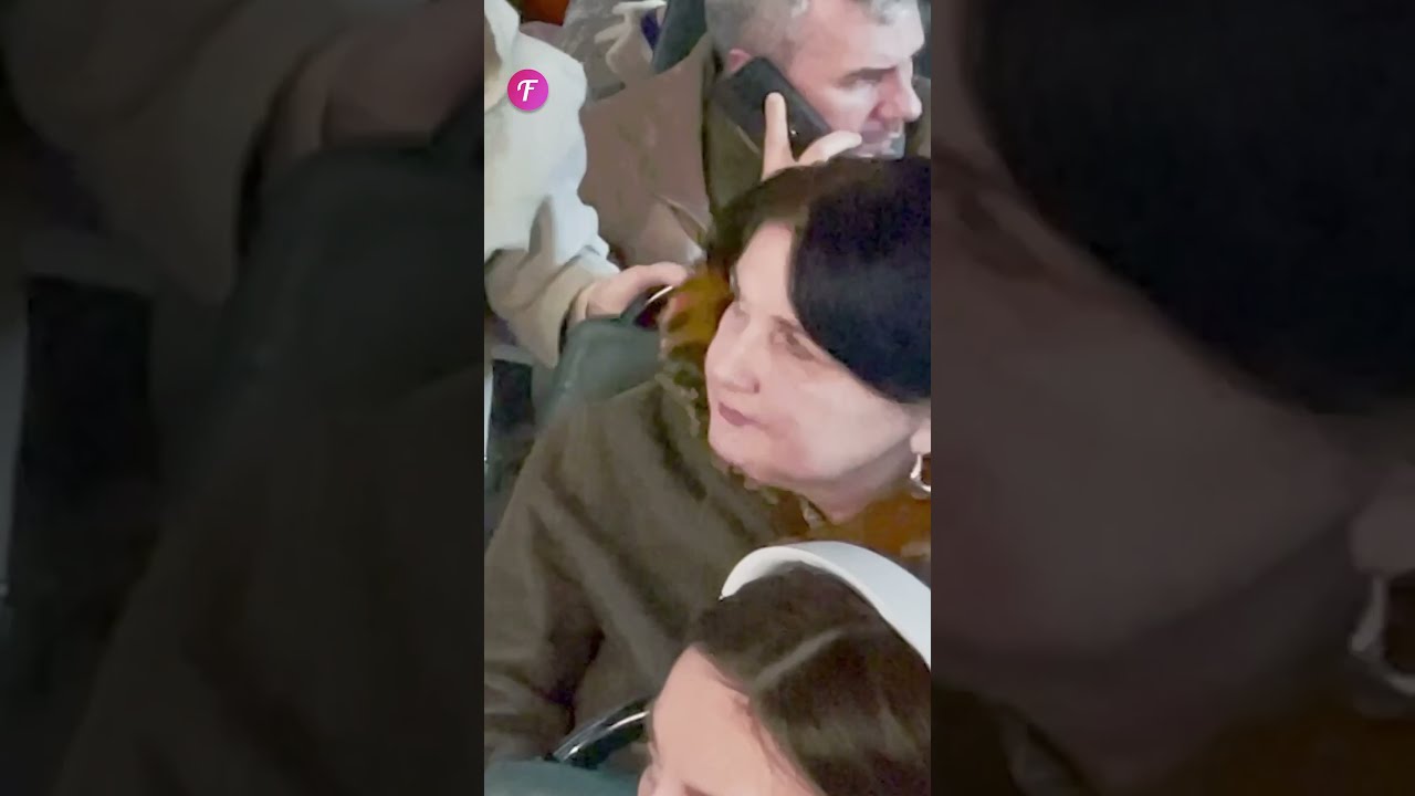 Good Samaritan Helps An Elderly Passenger Find A Seat Shorts