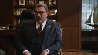 Two brief clips of Abigail Hawk standing and sitting in a black dress, sweater in nylons