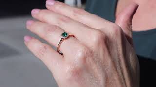 Solitaire ring «Chérie» with an emerald, ruby or sapphire center and a diamond halo.