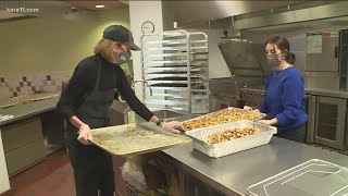 Volunteers in the Twin Cities prepare and deliver food to those in need