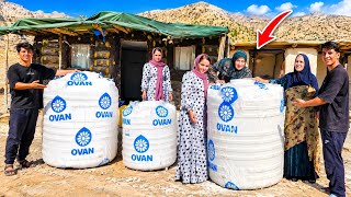 Hossein and Fereshteh buy a water tank for their new home:  A delightful gift for Mom.