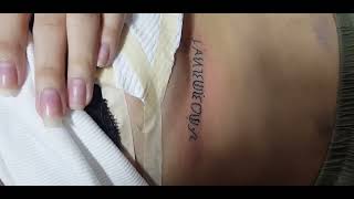 under rib tattoo