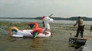 Watch Deputies Rescue Women Stranded on Rainbow Unicorn Float