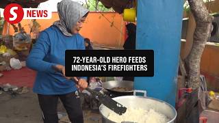 Volunteers feed firefighters battling wildfires in Indonesia's Central Kalimantan