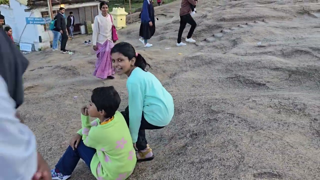 Nandi hills | bengalore | karnataka | family | shiva temple | clouds | blue |