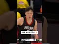Yang Hansen attacks the paint and rattles the rim with the one hand slam