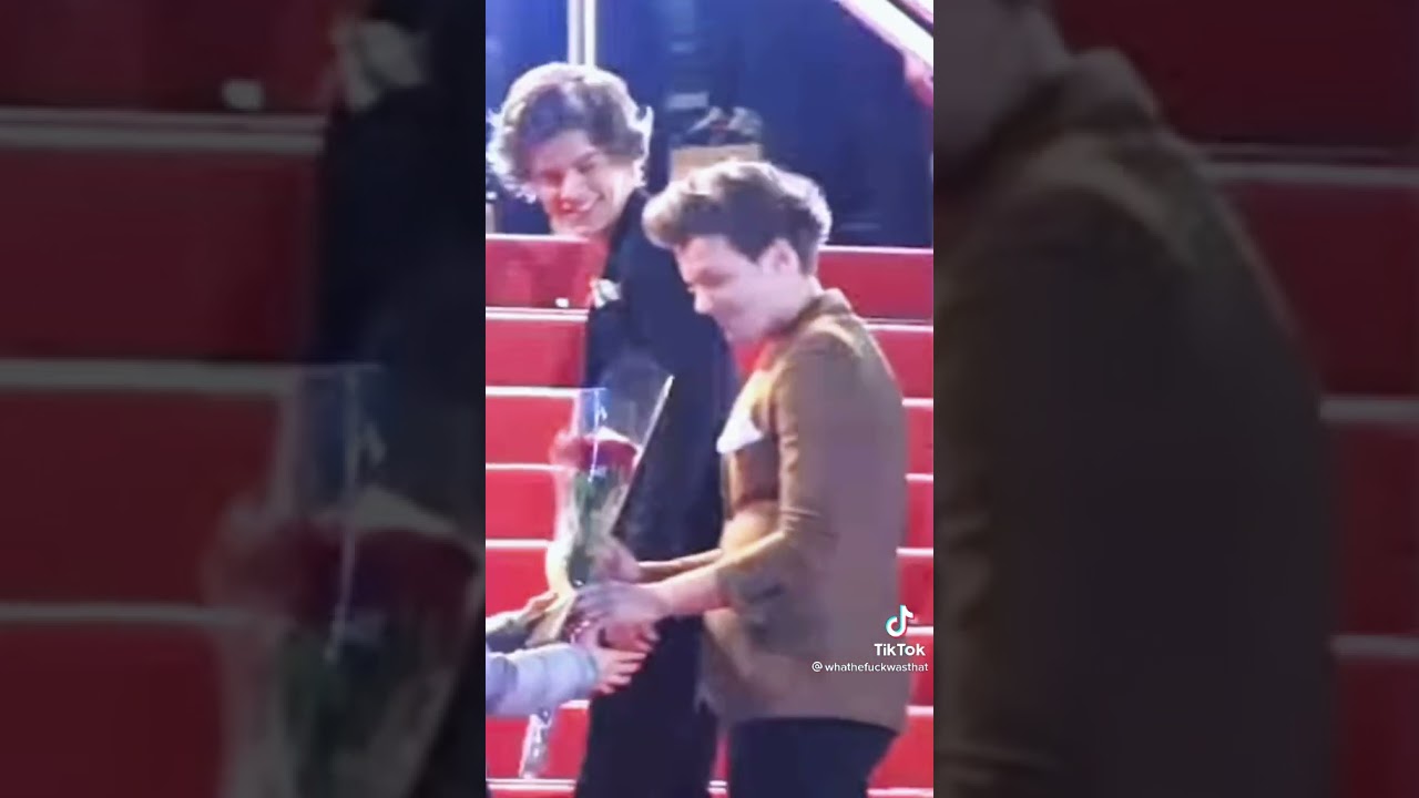 a little girl giving lou flowers 🥺💘