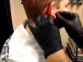 10G Earlobe Piercing By Michael Brazell