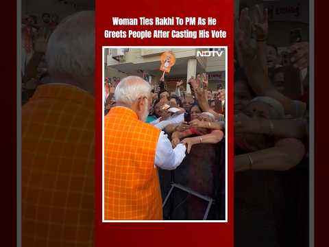 Lok Sabha Elections | Watch: Woman Ties Rakhi To PM Modi As He Greets People After Casting His Vote @NDTV