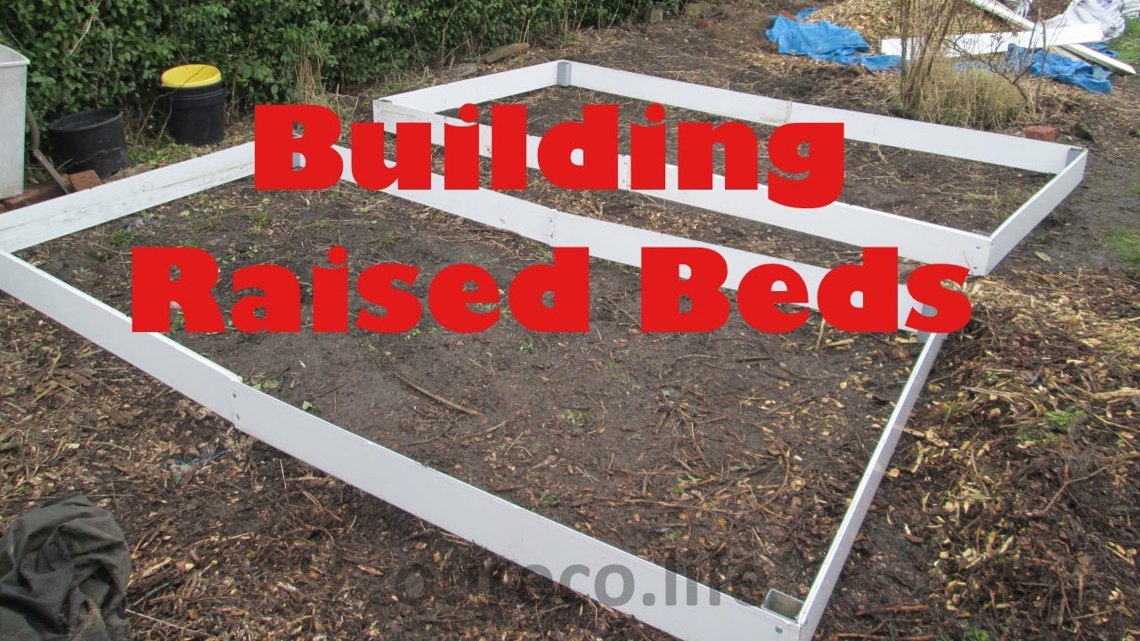 Building raised beds from drain pipes and floor boards Part two YouTube