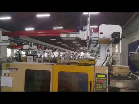 Cartesian robots/3 axis robots in an injection molding factory. - YouTube
