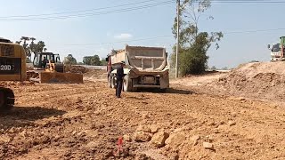 Dump truck and bulldozer shantui