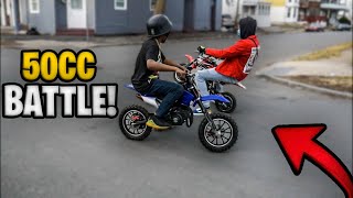 50CC DIRT BIKE BATTLE AND WHEELIES! JUSTDOITTRAY