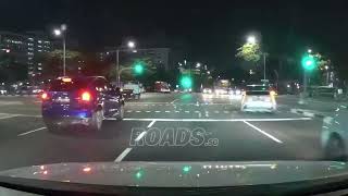 A car made an improper right turn, crossing multiple lanes in the process.