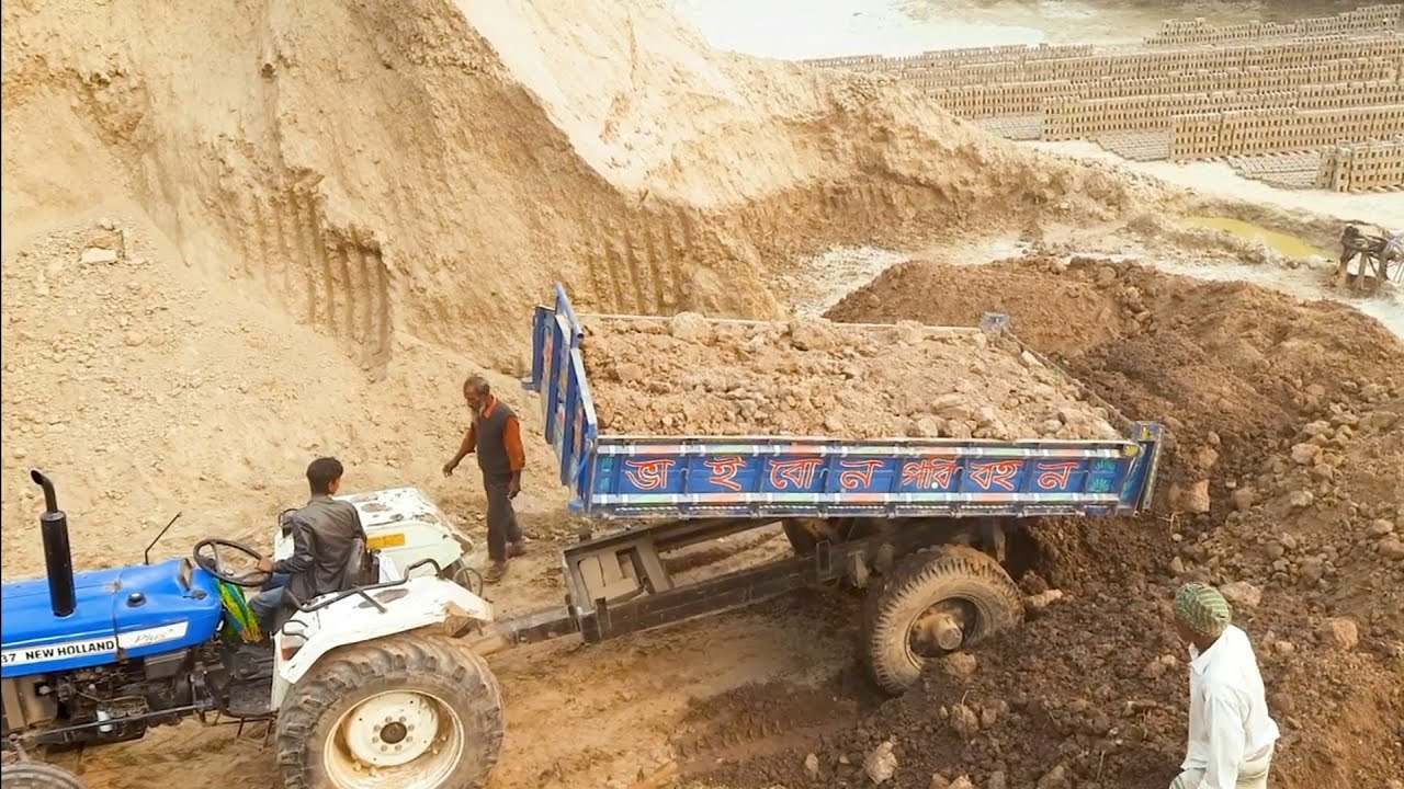 New Holland hydraulic tractor sand unloading video New unload facility tractor 23Ep39